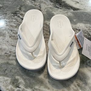 Croc flip flops, size 7, new with tags